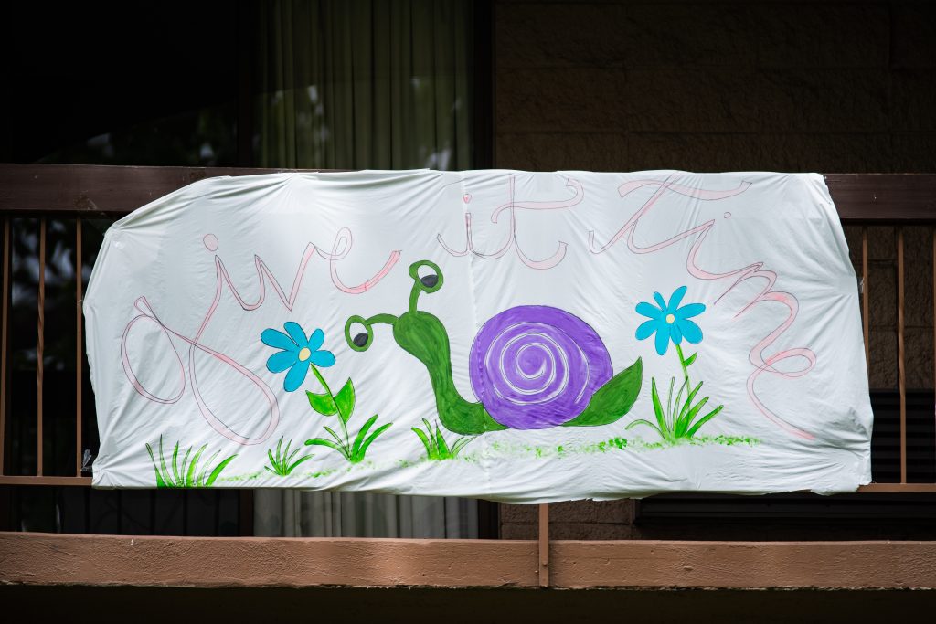Pictures of the hopeful banners hanging from the Cottonwood Hotel during COVID 19.