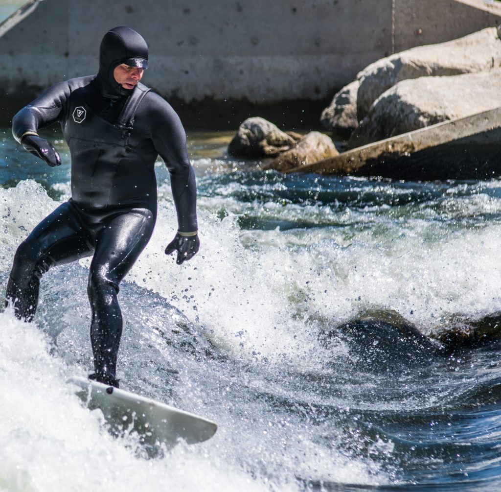 Photographs of surfers at Whitewater Park in Boise, Idaho in 2018. Photos by Terry Welch.